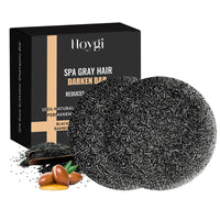 Thumbnail for Black hair darkening bar with packaging labeled 'Hoygi' on a white background