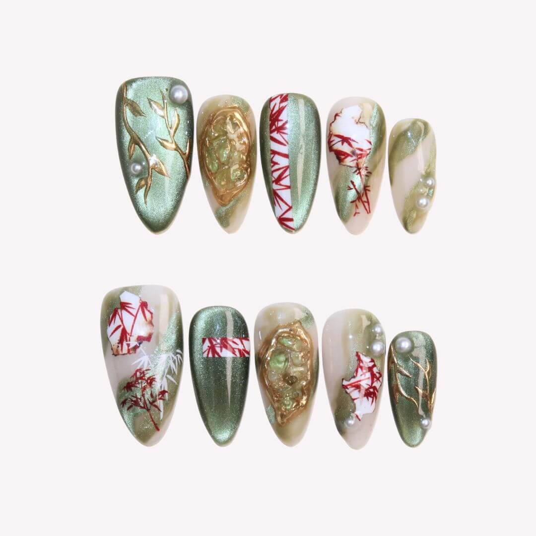 Set of decorative nails with various patterns on a white background