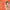 Advertisement for high premium collagen ampoule mist with a woman's face on an orange background