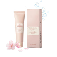 Thumbnail for Purifying Exfoliating Gel tube and packaging with cherry blossoms on a white background