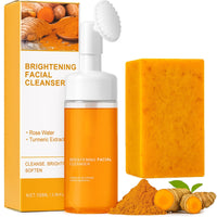 Thumbnail for Brightening facial cleanser with packaging, scrub, and turmeric root on a white background
